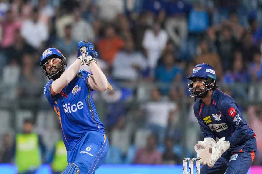 Mumbai: Mumbai Indians batter Naman Dhir plays a shot during the...