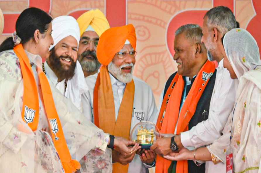 Patiala: Prime Minister Narendra Modi being felicitated during a...