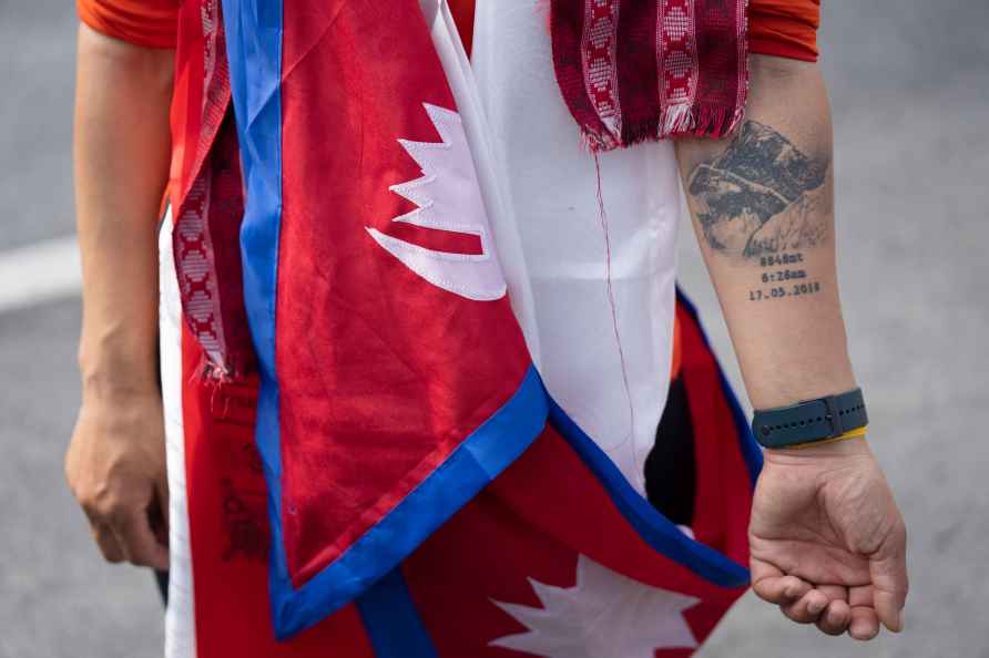 Phunjo Lama displays a tattoo of Mount Everest