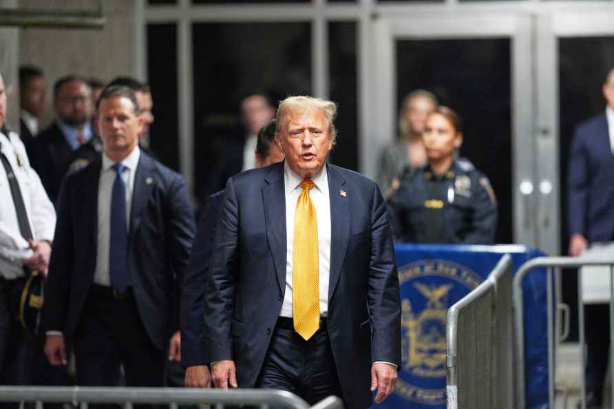 Former President Donald Trump speaks to the media as the jury deliberates...