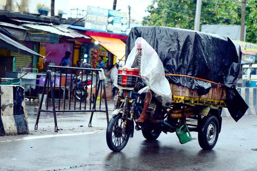 Birbhum: A man rides a cart after rainfall in the aftermath of Cyclone...