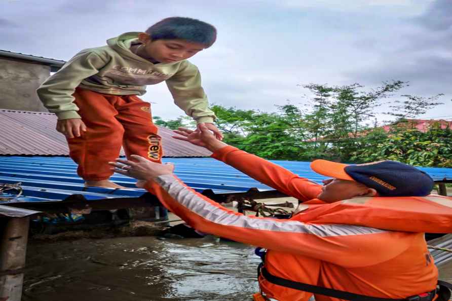 Imphal: An National Disaster Response Force (NDRF) personnel rescues...