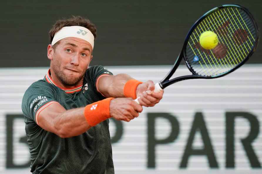 Norway's Casper Ruud plays a shot against Germany's Alexander Zverev...