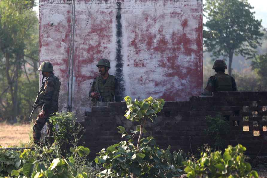 Kathua: Army personnel take positions near the site of the ongoing...