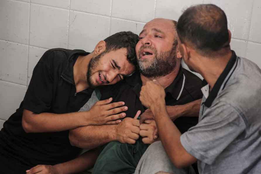 Father of Mohammad al-Habil weeps with his relatives