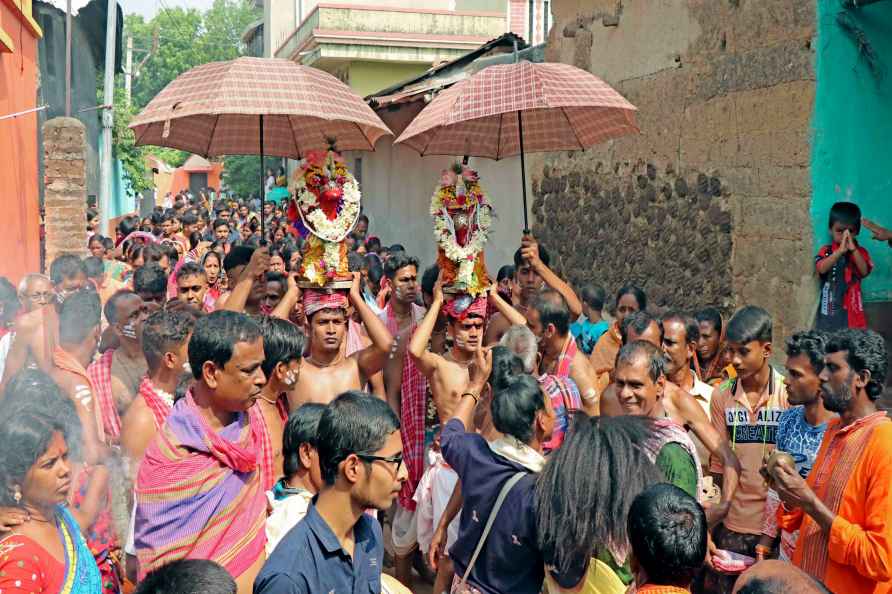 Birbhum: Priests carry idols of goddess 'Manasha' during a religious...