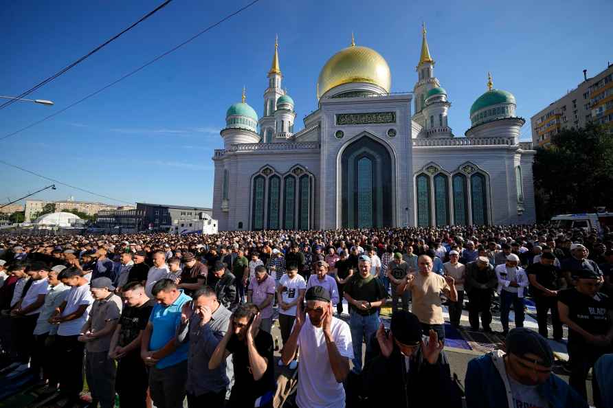 Muslims offer Eid al-Adha prayers at the Moscow Cathedral Mosque