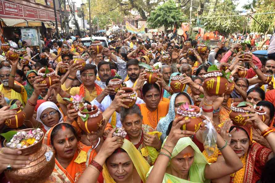 Varanasi: Devotees take part in a 'kalash' procession on 'Nirjala...