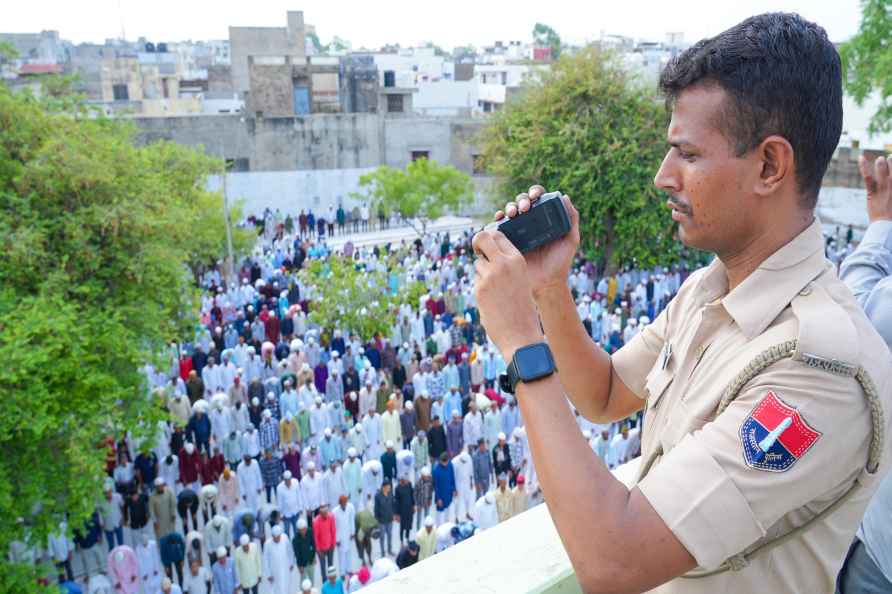 Beawar: A policeman keeps a watch as Muslim devotees offer 'namaz...