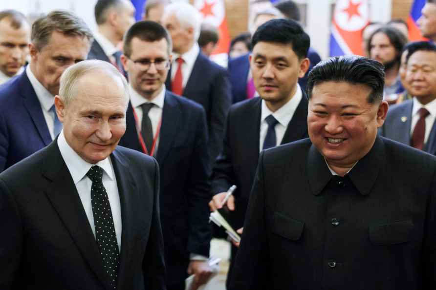 Russian President Vladimir Putin, left, and North Korea's leader...