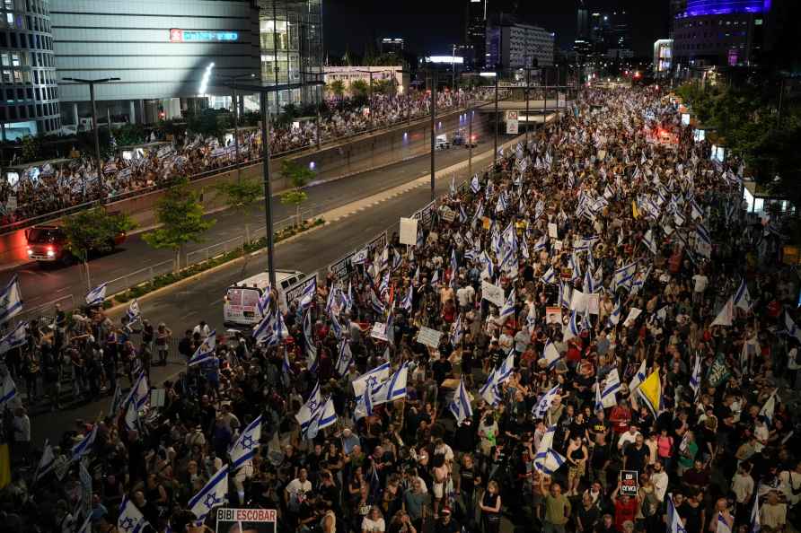 People protest against Israeli Prime Minister Benjamin Netanyahu...