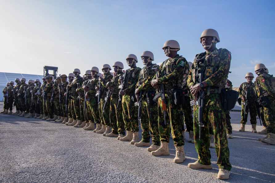 Kenyan police stand at their base
