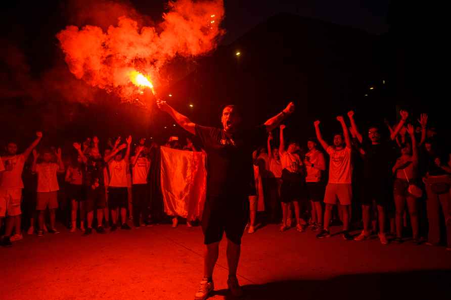 Romanian soccer fans celebrate downtown Bucharest