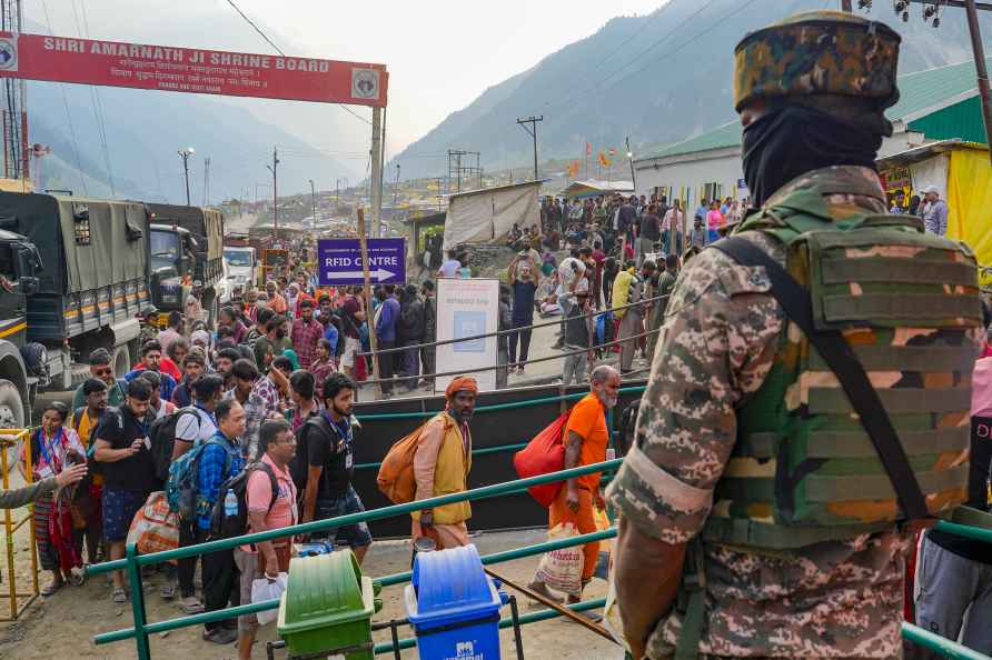 Baltal: A security personnel stands guard as the first batch of ...