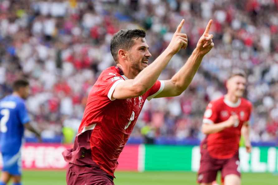 Switzerland's Remo Freuler celebrates after scoring during a round...