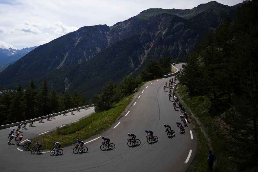 The pack rides during the fourth stage of the Tour de France cycling...