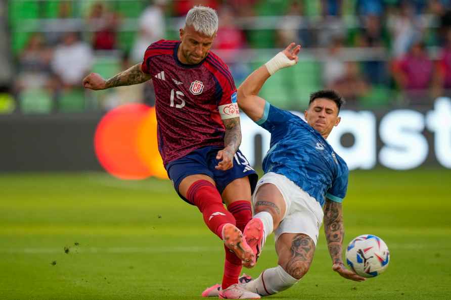 Costa Rica defender Francisco Calvo (15) shoots past Paraguay forward...