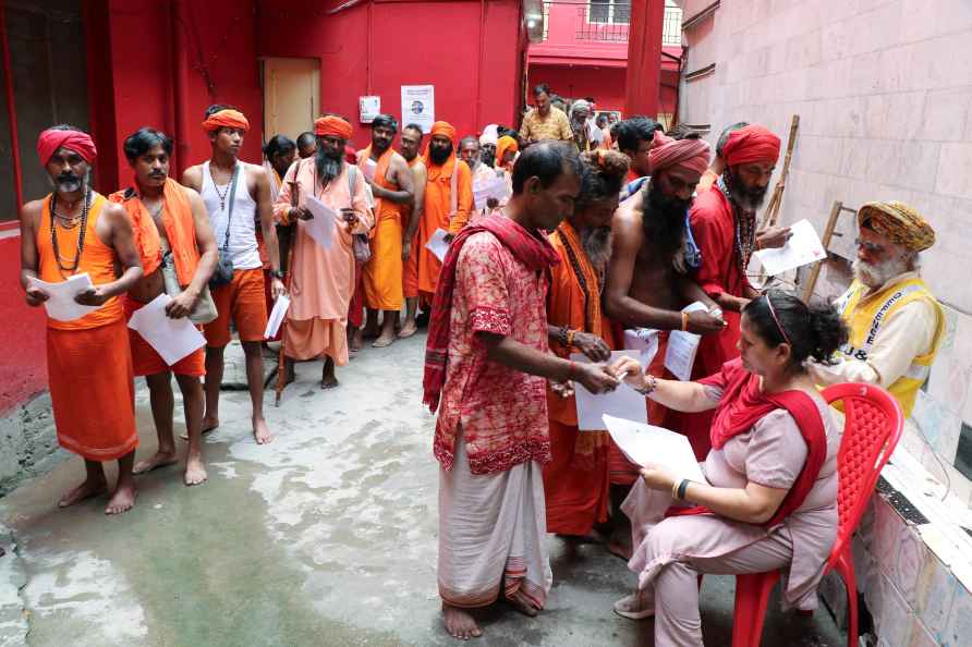 Jammu: Pilgrims wait to get themselves registered for the annual...