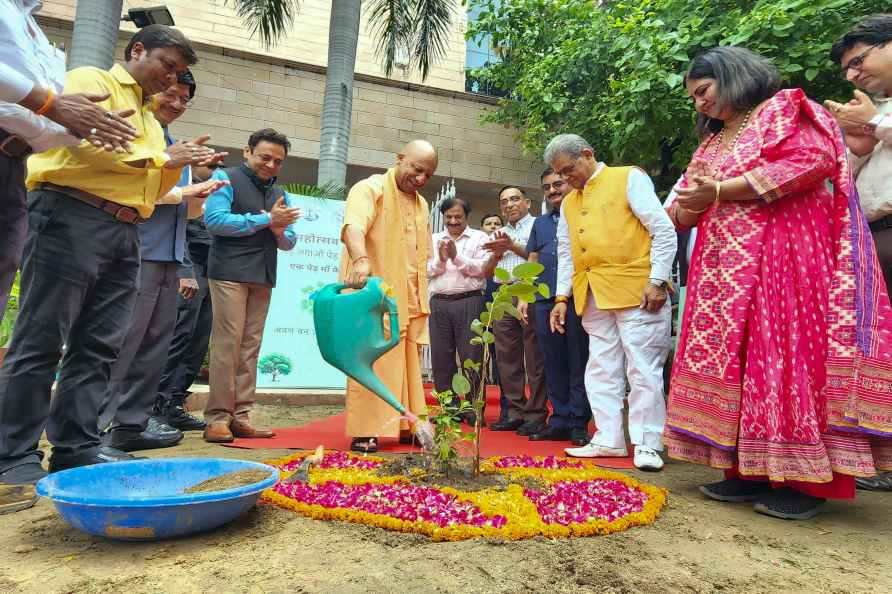 Yogi Adityanath planting a tree