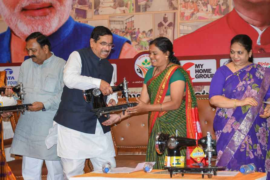 Prahlad Joshi distributes sewing machines