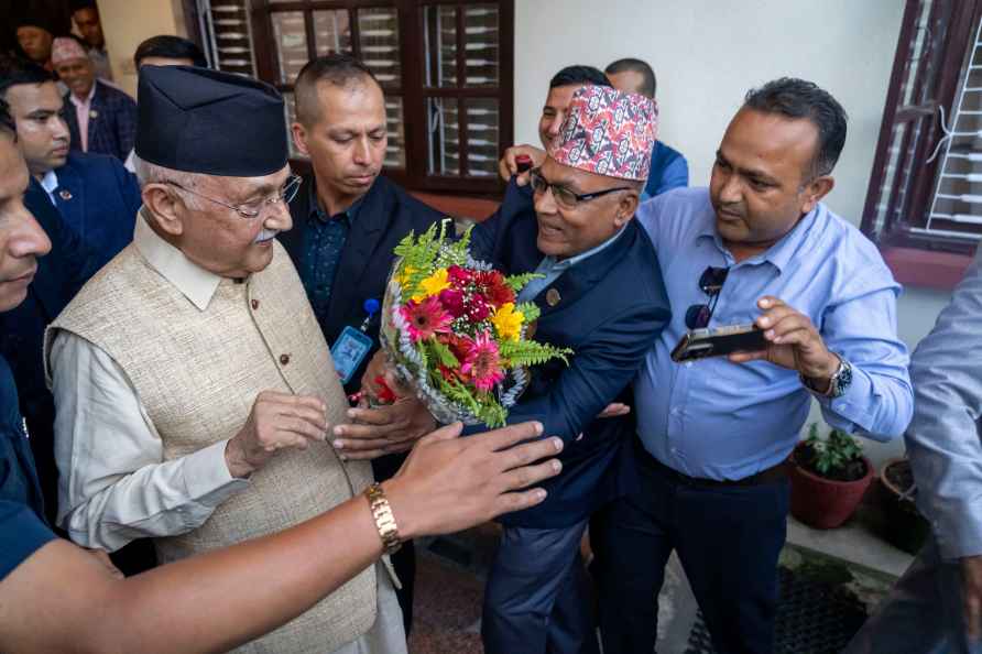 Khadga Prasad Oli, left, the chairman of the Communist Party of ...