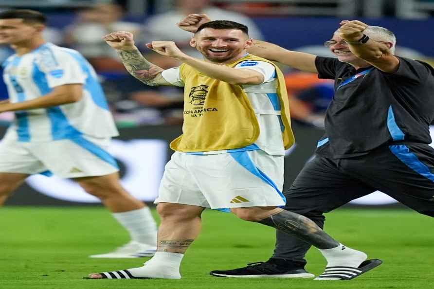 Argentina's Lionel Messi celebrates after his team defeated Colombia...