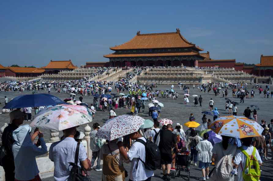 Tourists visit the Forbidden City