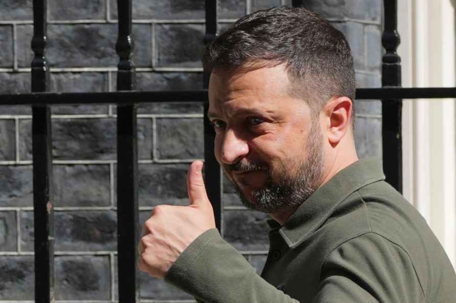 Ukraine's President Volodymyr Zelenskyy leaves Downing Street after...