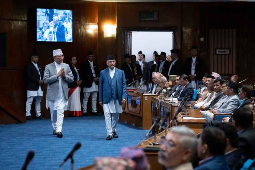 Nepalese Prime Minister Khadga Prasad Oli arrives to ask for a vote...