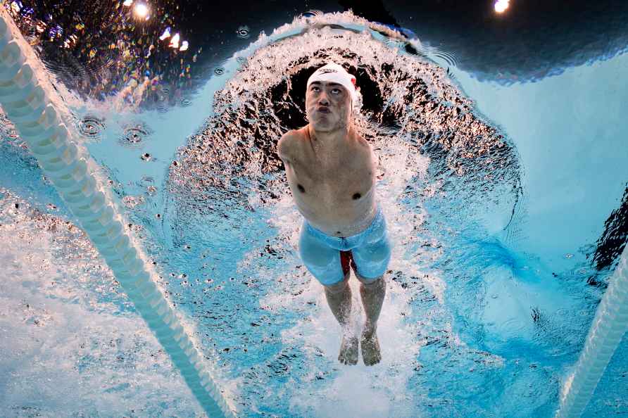 China's Weiyi Yuan competes in the Para Swimming Men's 50m Freestyle...