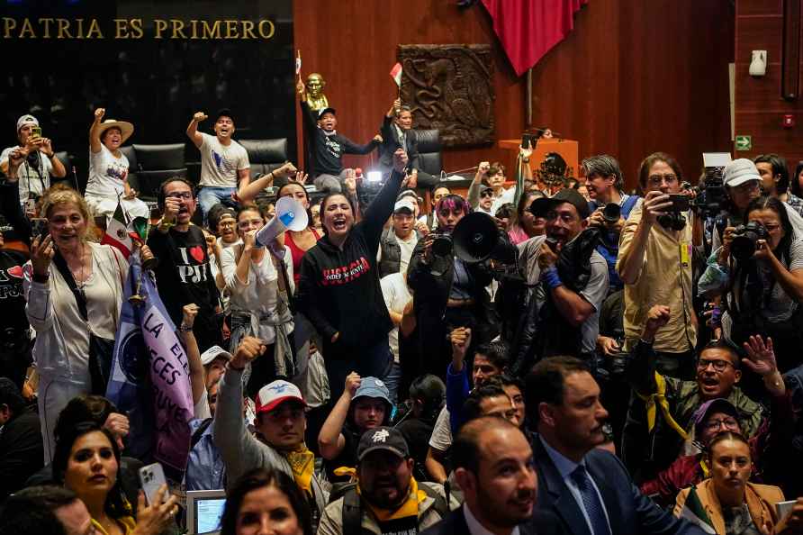 Protesters break into a Senate session in which lawmakers were debating...