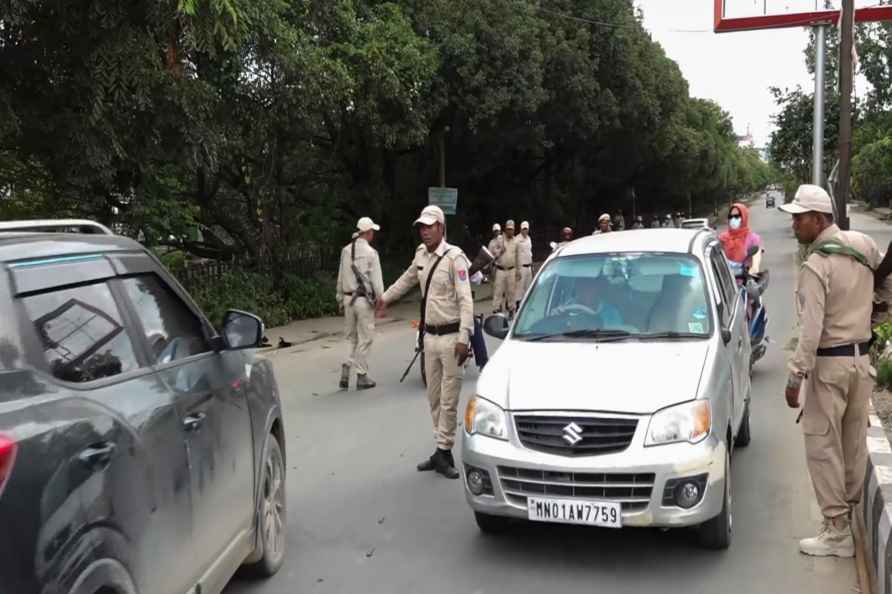 **EDS: SCREENSHOT VIA PTI VIDEOS** Imphal: Police personnel check...