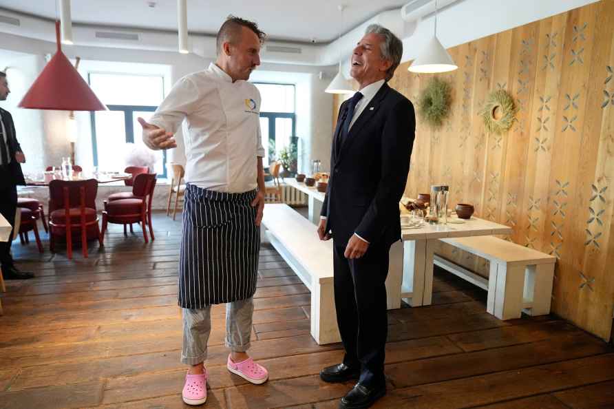 U. S. Secretary of State Antony Blinken speaks with chef Yevhen ...