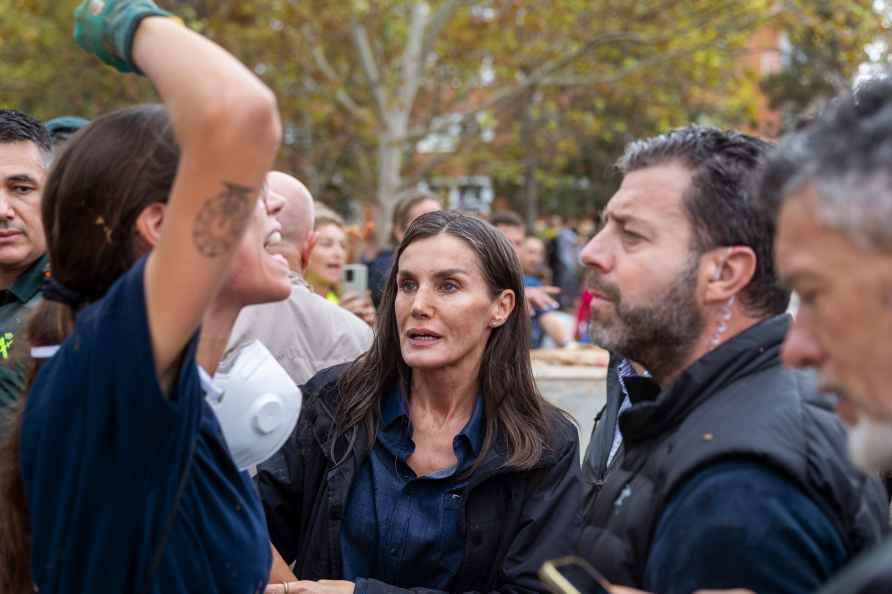 Spain's Queen Letizia speaks with people