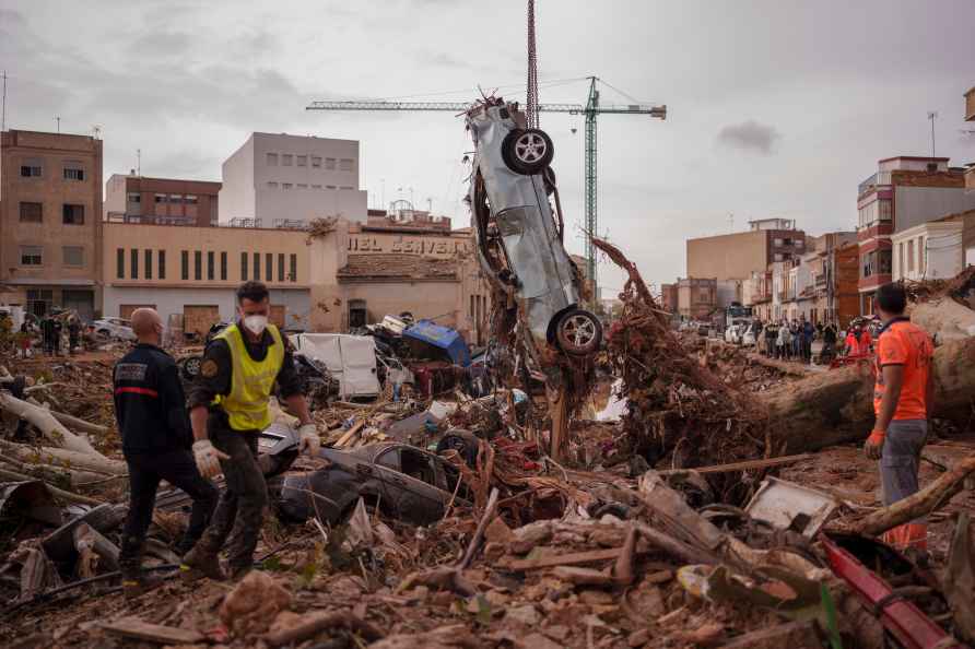 Emergency services remove cars