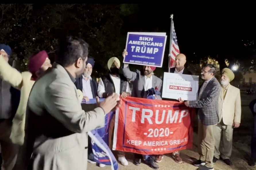 Trump supporters dance near White House