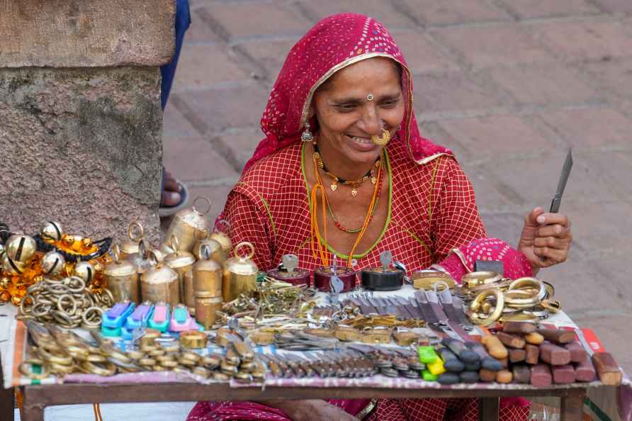 Pushkar: A Rajasthani nomad vendor waits for customers, in Pushkar...