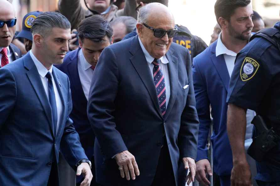 Rudy Giuliani, center, arrives to federal court in New York, Thursday...